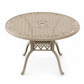 Mesa de exterior redonda de aluminio fundido con tablero calado beige arena 105 cm x 105 cm x 73 cm con orificio para sombrilla